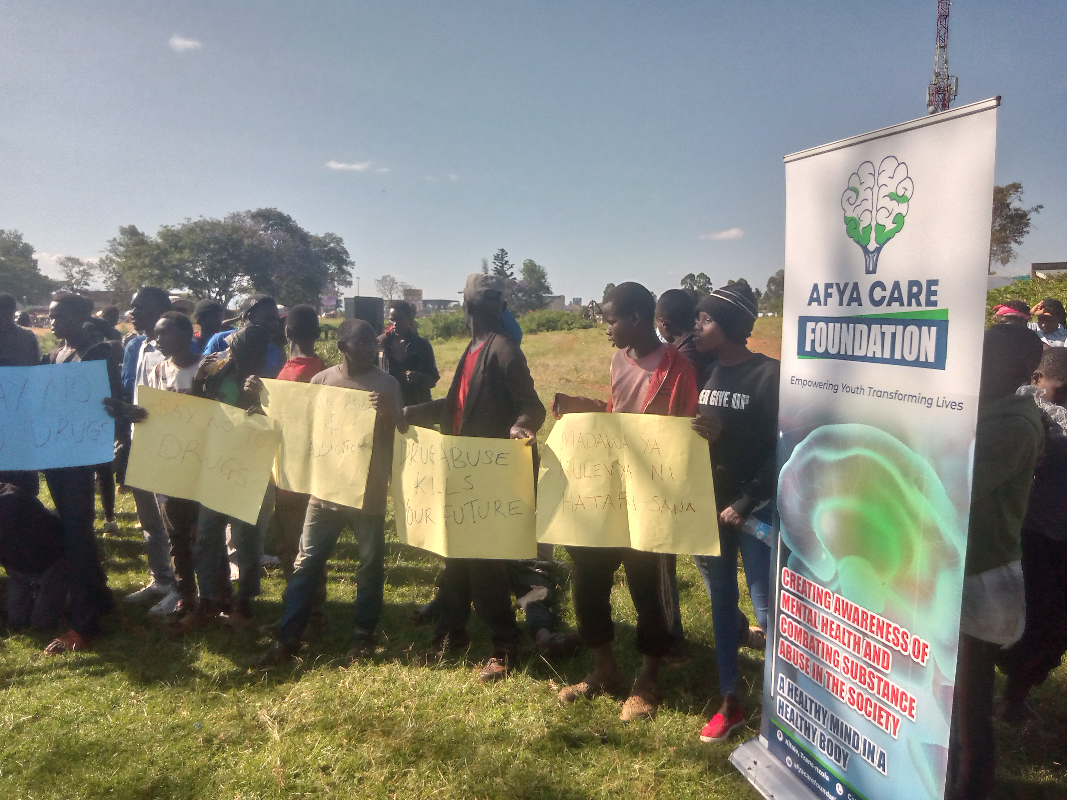 Afya Care Foundation team meeting young people during a street outreach in Kitale